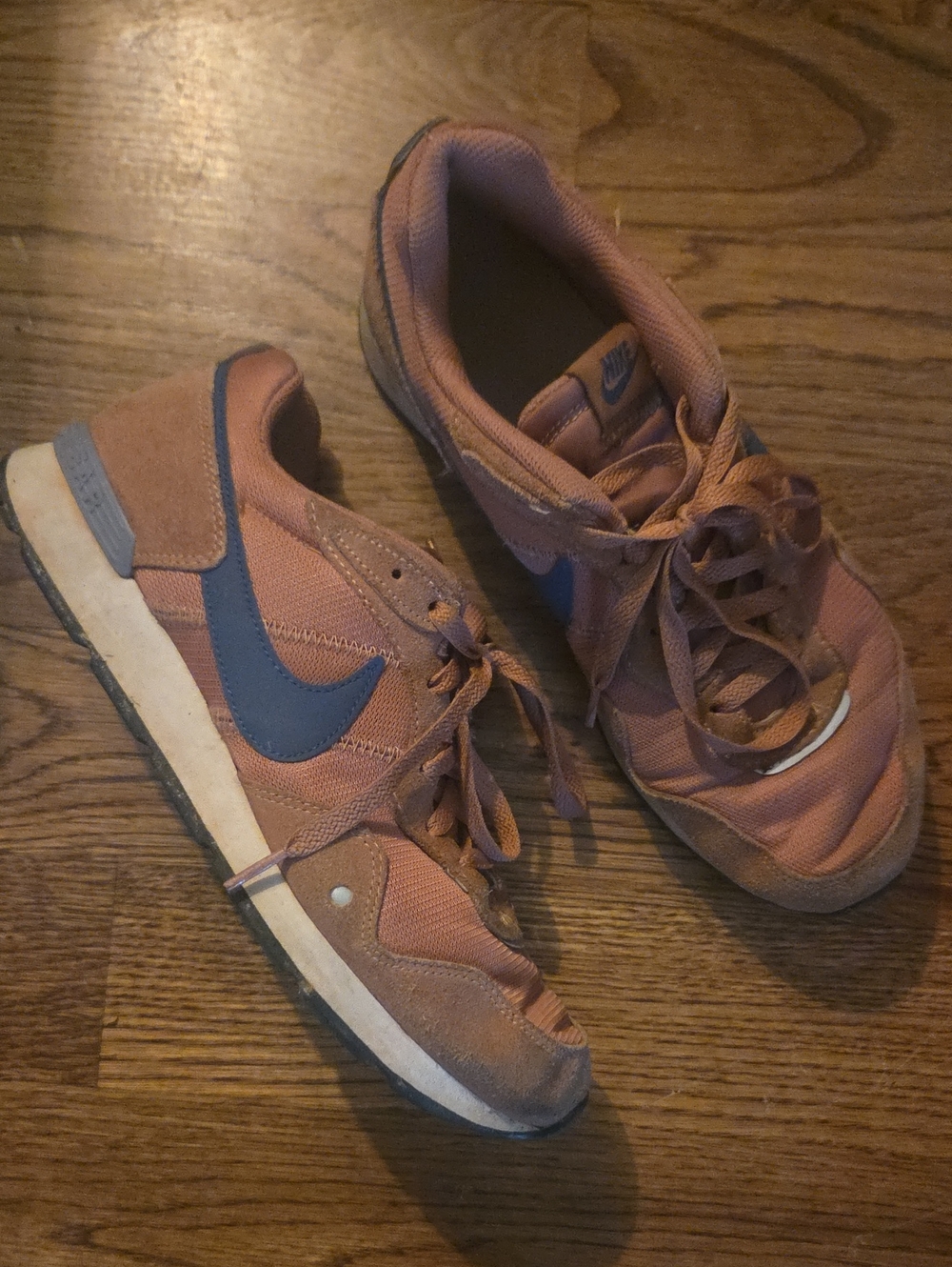 Nike Men's Sneakers in Rust Orange with Blue Swoosh